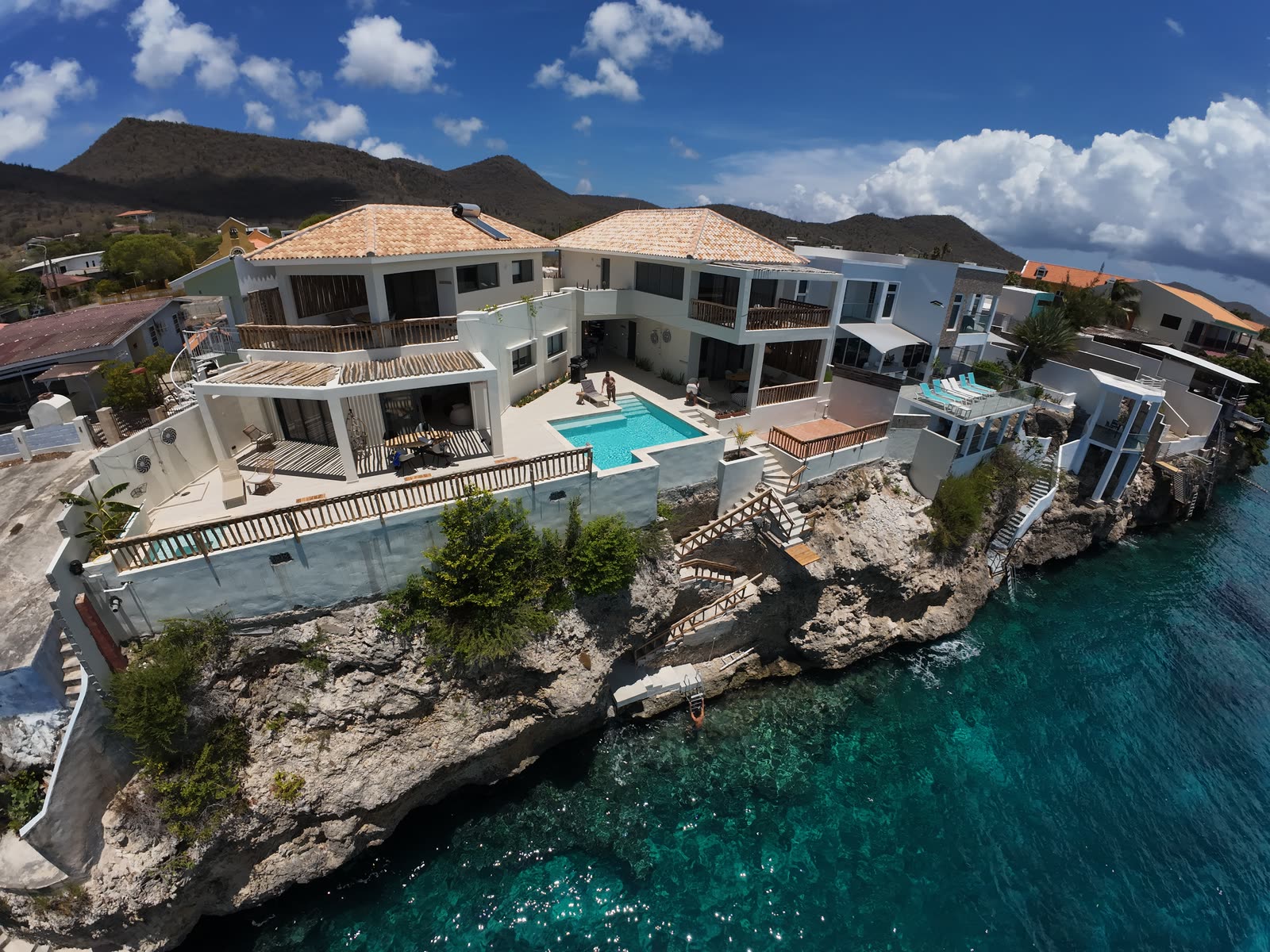 The villa on the limestone cliff above Lagun Bay